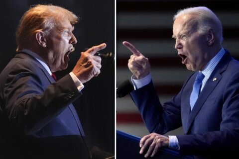 A raspy and sometimes halting Biden tries at debate to confront Trump, who responds with falsehoods