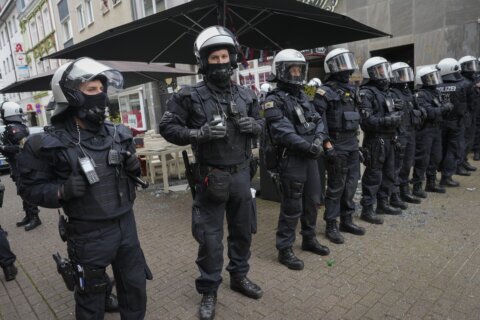 German police intervene to stem clashes between England and Serbia fans ahead of Euro 2024 match