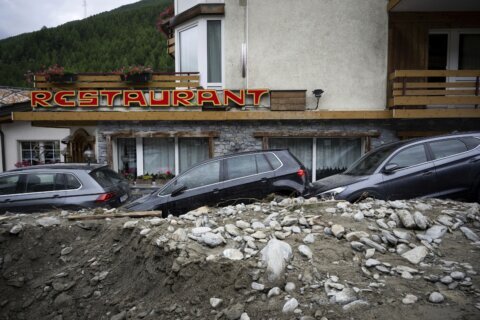 Storms in Switzerland and Italy cause flooding and landslides, leaving at least 4 people dead