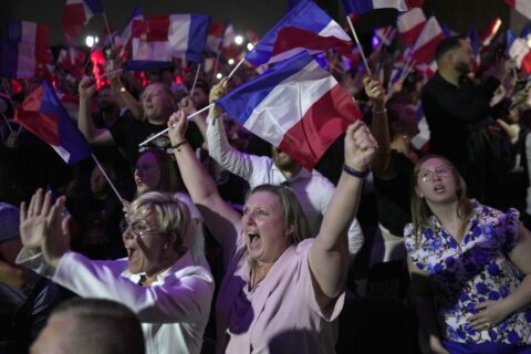 France’s far-right National Rally says it will lead a government only with an absolute majority