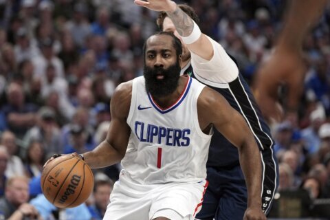 Harden staying with Clippers, Love staying with Heat, AP sources say