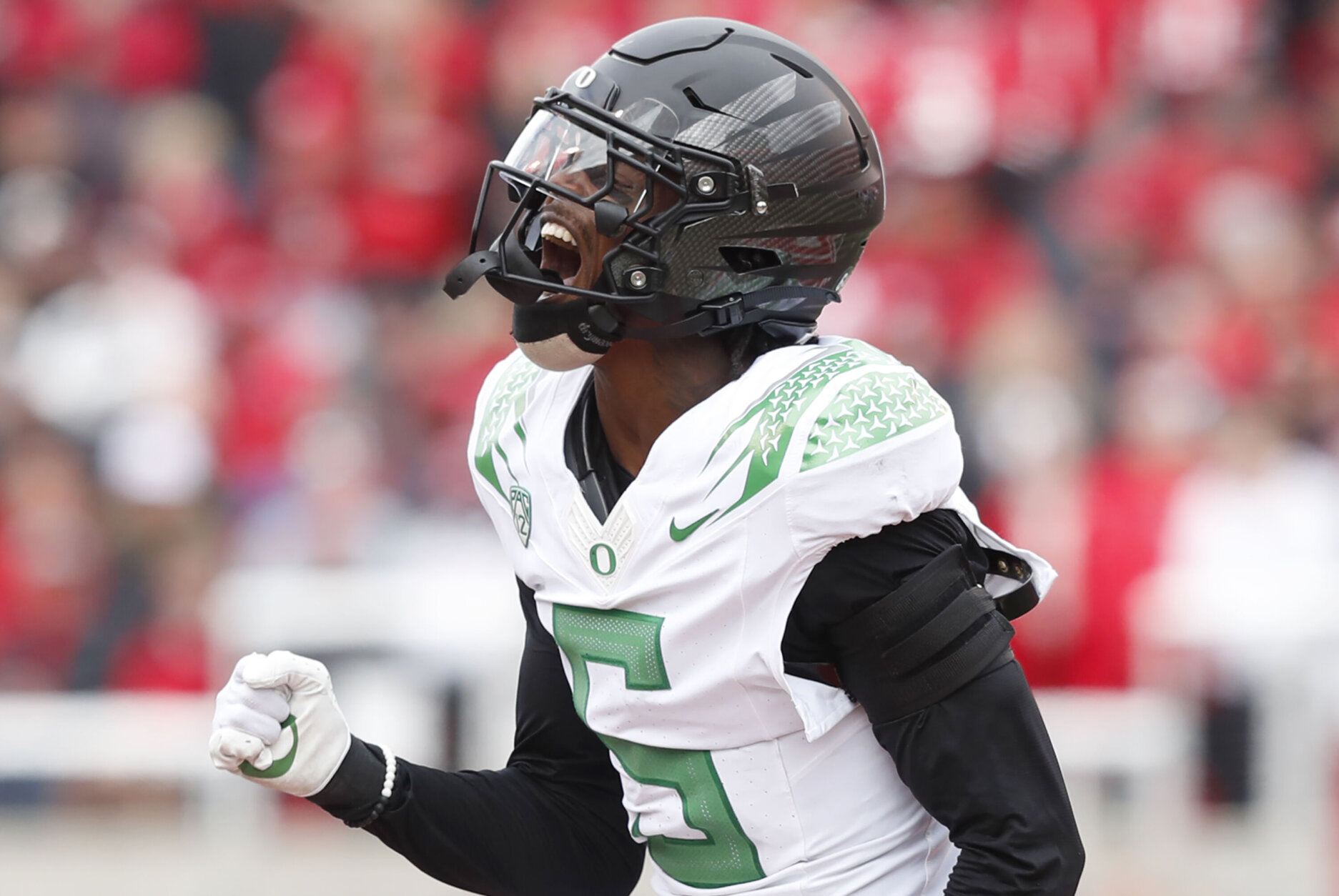 SALT LAKE CITY, UT - OCTOBER 28:  Khyree Jackson #5 of the Oregon Ducks reacts after making a tackle on the Utah Utes during the first half of their game at Rice Eccles Stadium on October 28, 2023 in Salt Lake City, Utah.  (Photo by Chris Gardner/Getty Images)