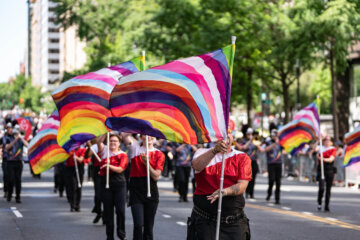 Participants march in the annual Capital Pride Parade in Washington, DC, on June 8, 2024. (Photo by andrew thomas / AFP) (Photo by ANDREW THOMAS/AFP via Getty Images)