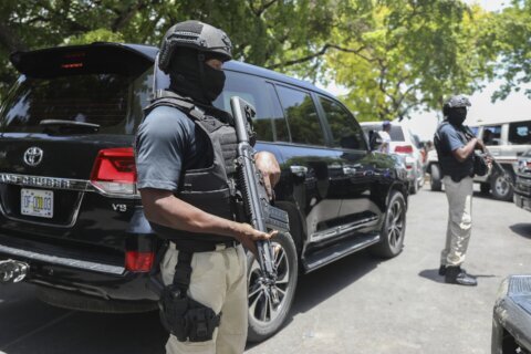 Haitian leaders oust police chief and appoint a new one as gang violence claims officers’ lives