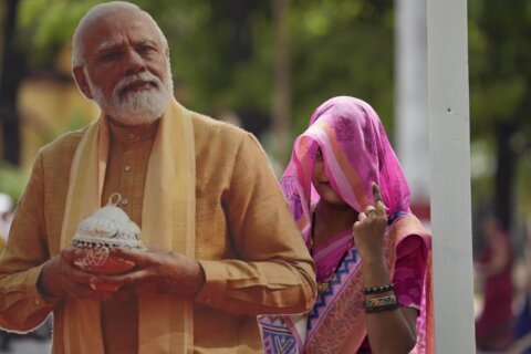The Latest | India counts votes from a mega-election seen as a referendum on Modi