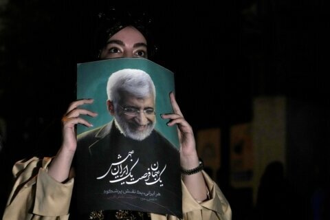 Two candidates drop out of Iran presidential election, due to take place Friday amid voter apathy