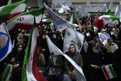 Iran votes in snap poll for new president after hard-liner’s death amid rising tensions in Mideast