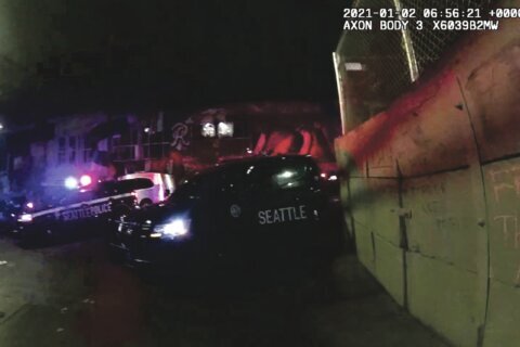 Jury awards $700k to Seattle protesters jailed for writing anti-police slogans in chalk on barricade