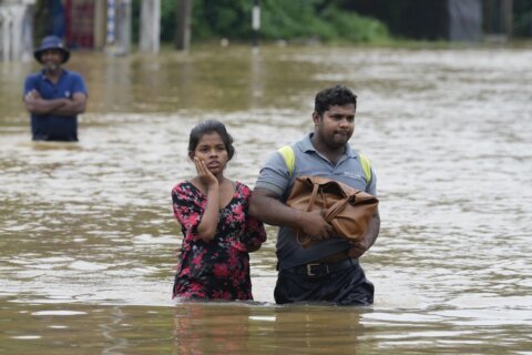 Sri Lanka closes schools as the death toll from floods and mudslides rises to 16