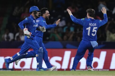 Afghanistan stuns Australia to keep Twenty20 World Cup dream alive. India beat Bangladesh