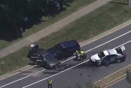 A man stole a Fairfax County police cruiser and then crashed into another cruiser Friday, injuring two officers, authorities in the Virginia county say. (Courtesy 7News)