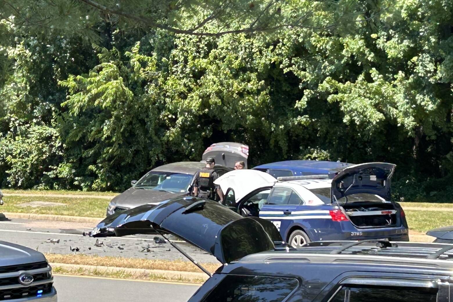A man stole a Fairfax County police cruiser and then crashed into another cruiser Friday, injuring two officers, authorities in the Virginia county say.  (WTOP/Scott Gelman)