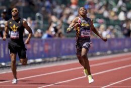 Quincy Wilson wins a heat men's 400-meter run during the U.S. Track and Field Olympic Team Trials Friday, June 21, 2024, in Eugene, Ore. (AP Photo/Charlie Neibergall)