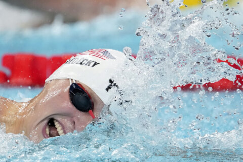 Katie Ledecky starts Olympic swimming with fastest time in 400 free prelims, just ahead of Titmus