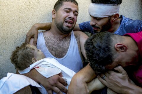 A Gaza father mourns his baby boy, killed in bed by an Israeli airstrike