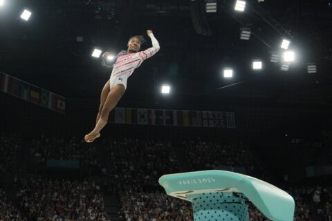 Olympics gymnastics latest: Simone Biles narrowly leads Rebeca Andrade entering final rotation