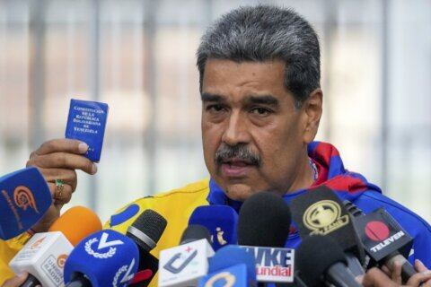 The Latest: Maduro is declared winner in Venezuela election as opposition claims irregularities