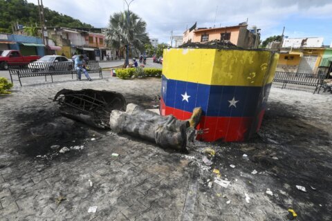 Hugo Chávez statues targeted across Venezuela in post-election unrest
