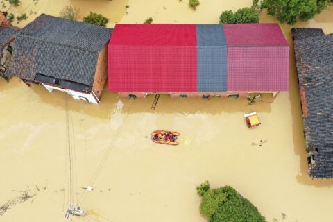 China reports 7 more deaths from torrential rains brought by tropical storm, raising toll to 22