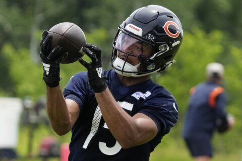 Bears agree to deal with quarterback Caleb Williams, AP source says; receiver Rome Odunze signed