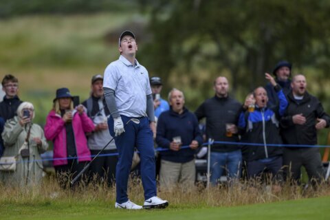 MacIntyre wins his national open in Scotland with birdie to beat Adam Scott