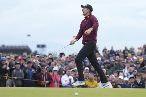 Justin Rose ‘choking back tears’ after Xander Schauffele surges to British Open title