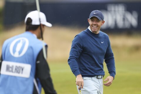 Tiger Woods says even champions miss putts. Rory McIlroy gets the message at British Open