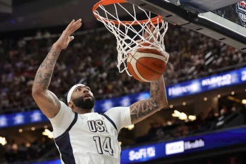 US wastes most of big lead, holds on to beat Australia 98-92 in tuneup for Paris Olympics