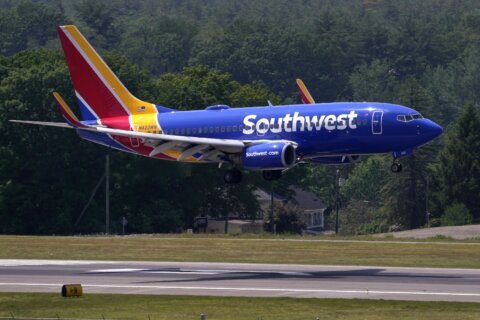 Southwest breaks with 50-year tradition and will assign seats; profit falls at Southwest, American