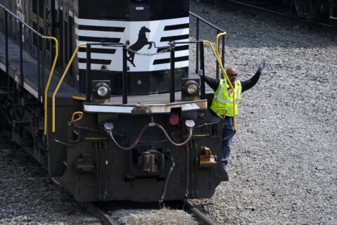 Norfolk Southern profits complicated by derailment insurance payments, proxy fight and productivity