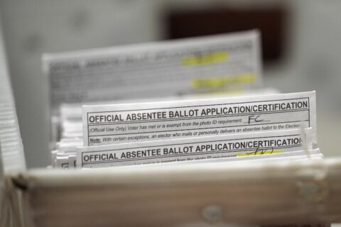 Judge dismisses lawsuit challenging absentee voting procedure in battleground Wisconsin