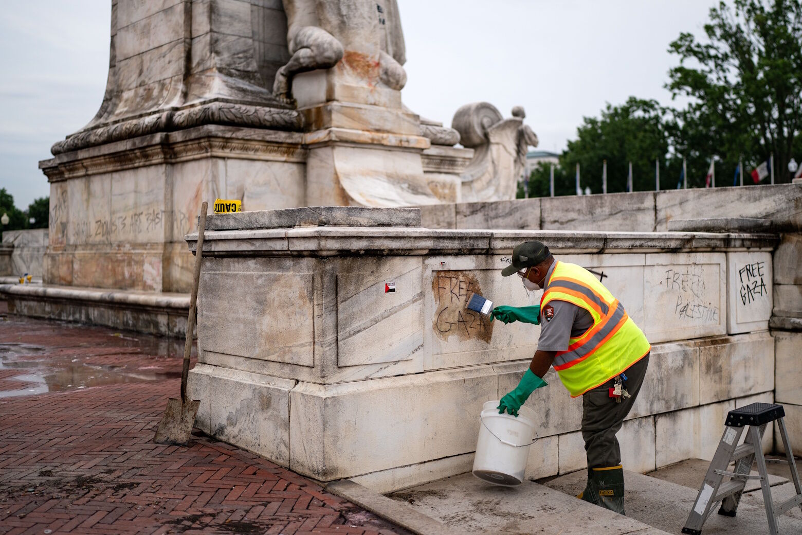 WASHINGTON, DC - JULY 25: National Park Service workers attempt to remove graffiti at Union Station on July 25, 2024 in Washington, DC. The flags were removed during the protests surrounding Israeli Prime Minister Benjamin Netanyahu's address to a joint meeting of Congress which occured as the Israel Hamas war inches closer to a ten month anniversary. (Photo by Kent Nishimura/Getty Images)