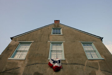 HARPERS FERRY, WV - JULY 05: A building in Harpers Ferry, a town that witnessed the first successful application of interchangeable manufacture, the arrival of the first successful American railroad, John Brown's attack on slavery, the largest surrender of Federal troops during the Civil War, and the education of former slaves in one of the earliest integrated schools in the United States July 5, 2005 in Harpers Ferry, West Virginia. The town lays within the "Journey Through Hallowed Ground" Corridor, which encompasses a 175-mile-long stretch of land from Gettysburg, PA to Monticello, VA, has been recognized by national historians as the region that holds more American history than any other place in the country. The land is imminently threatened by suburban sprawl, according to the recently released study by the National Trust for Historic Preservation in its annual list of America's most endangered historic places.  (Photo by Joe Raedle/Getty Images)