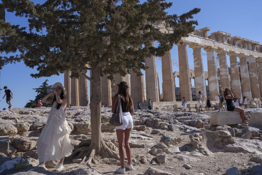 Greece shuts Acropolis during hottest part of day as southern Europe swelters in a heat wave