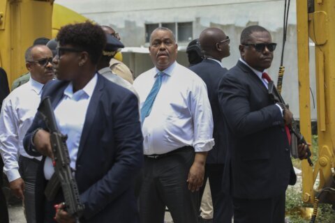 Haitian prime minister tours Port au Prince hospital after police take back from gang control