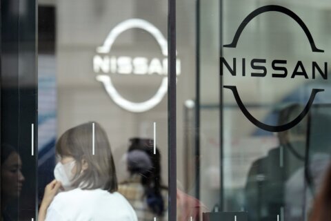 Japanese automaker Nissan lowers its profit forecast amid incentive, inventory woes