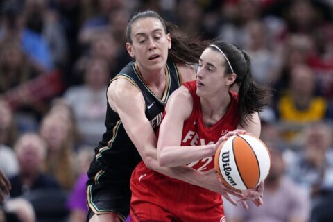 Caitlin Clark rallies Fever past Liberty 83-78 with first triple-double by WNBA rookie