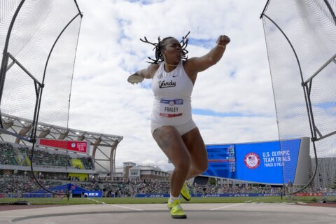 Flavor Flav helps Olympic discus thrower Veronica Fraley who said she struggles to pay the rent