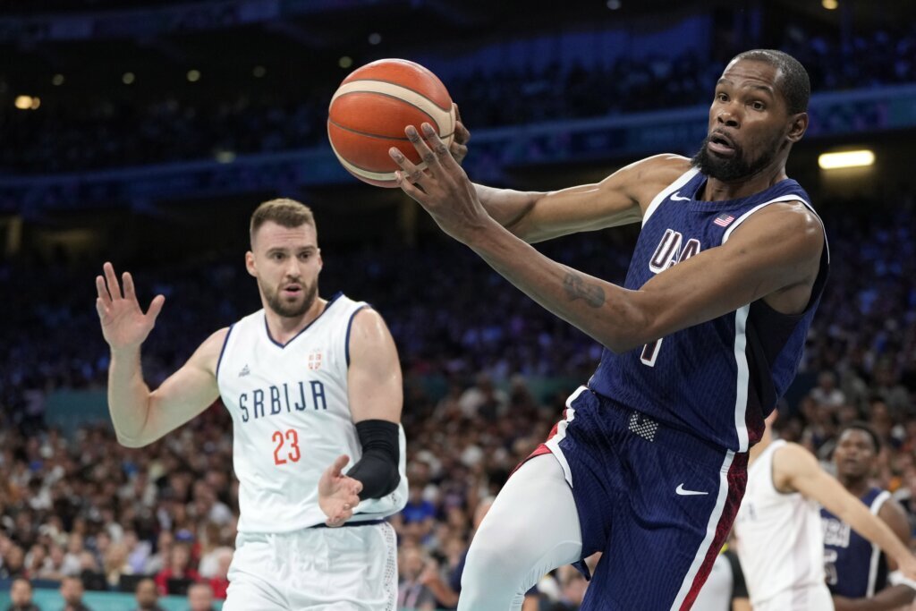 US men’s basketball team rolls past Serbia 110-84 in opening game at the Paris Olympics