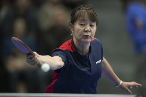 Chinese-Chilean table tennis player makes Olympics debut at age 58 in the Paris Games