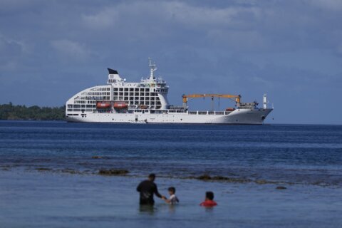 Olympic surfers sleep on a cruise ship in Tahiti, a first for the Games
