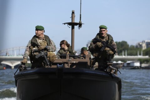 In and on the water, French troops secure the River Seine for the Paris Olympics opening ceremony