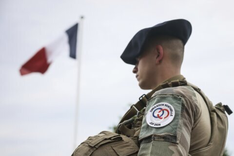 Attacker stabs and wounds French soldier patrolling Paris ahead of the Olympics