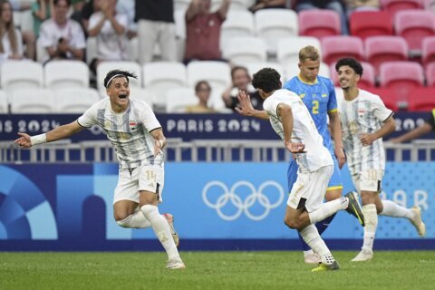 France beats US 3-0 and Morocco gets a win against Argentina in a wild start to Olympic soccer