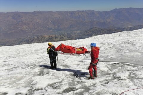 The body of an American climber buried by an avalanche 22 years ago in Peru is found in the ice