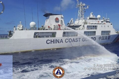 The Philippines says its forces sailed to hotly disputed shoal guarded by China without any clashes