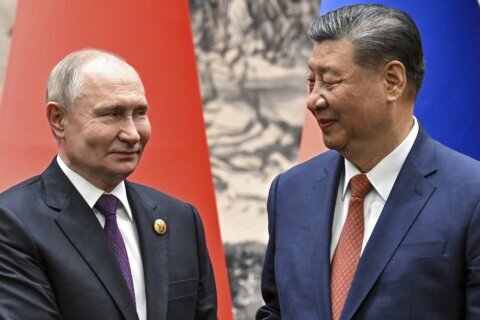 Leaders of Russia and China meet at a Central Asian summit in a show of deepening cooperation