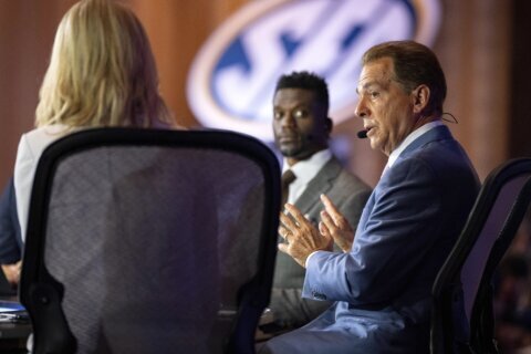 Nick Saban is back at SEC Media Days, six months after retiring and asking the questions now