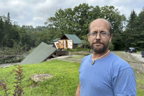 Vermont man evacuates neighbors during flooding, weeks after witnessing a driver get swept away