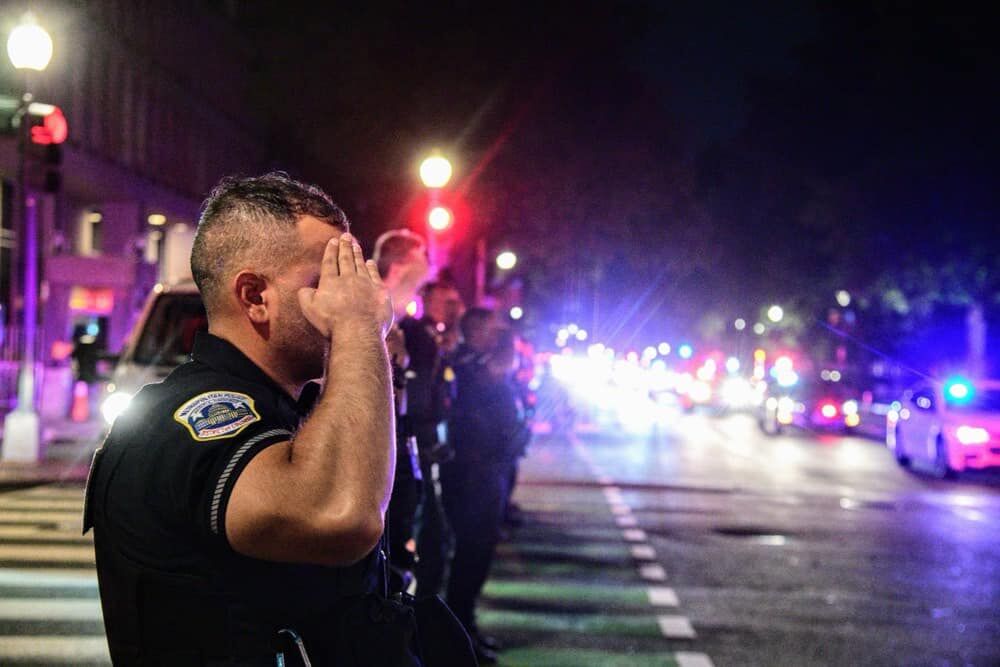 police officers saluting